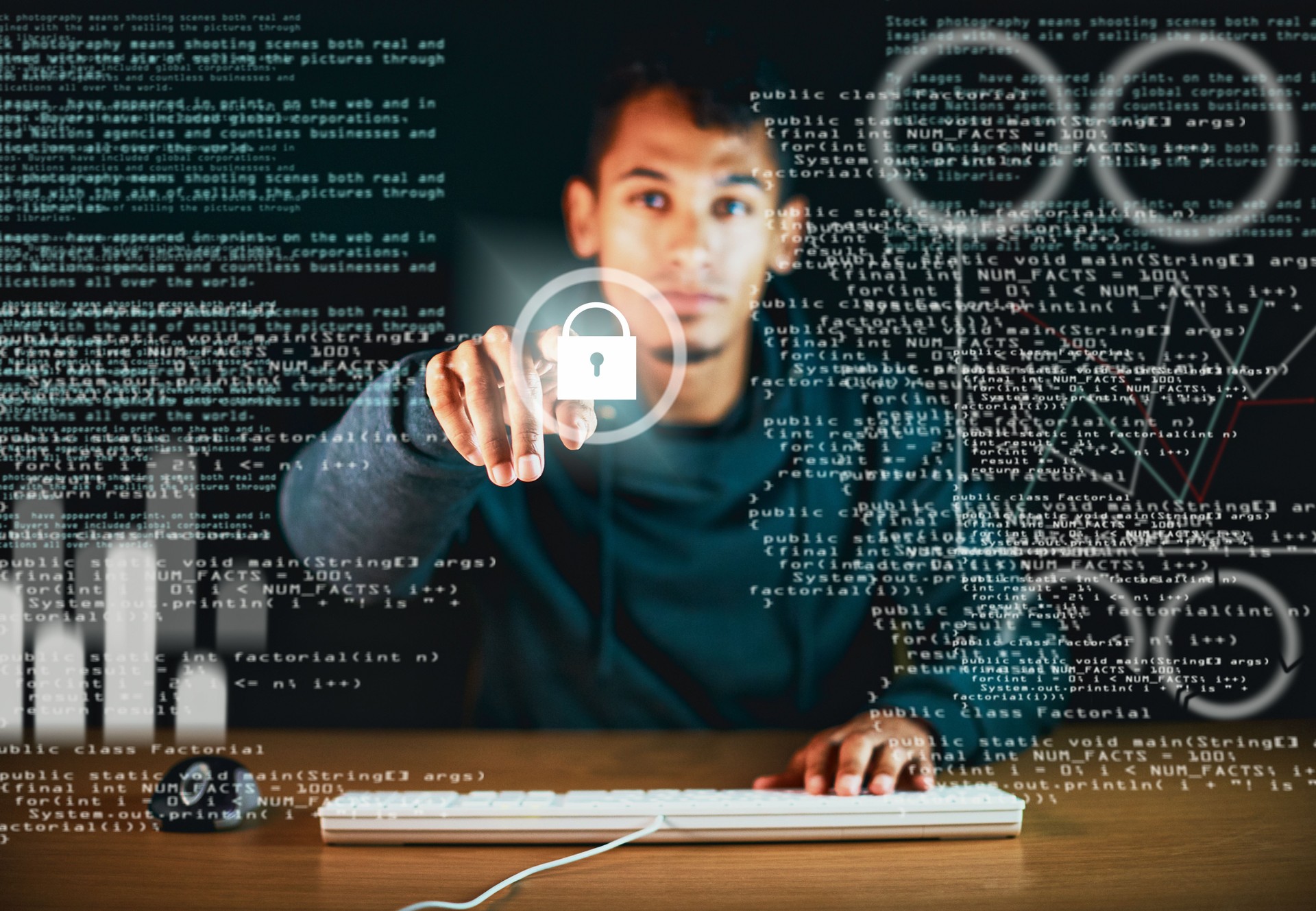 Man using keyboard looks at password symbol on interactive screen