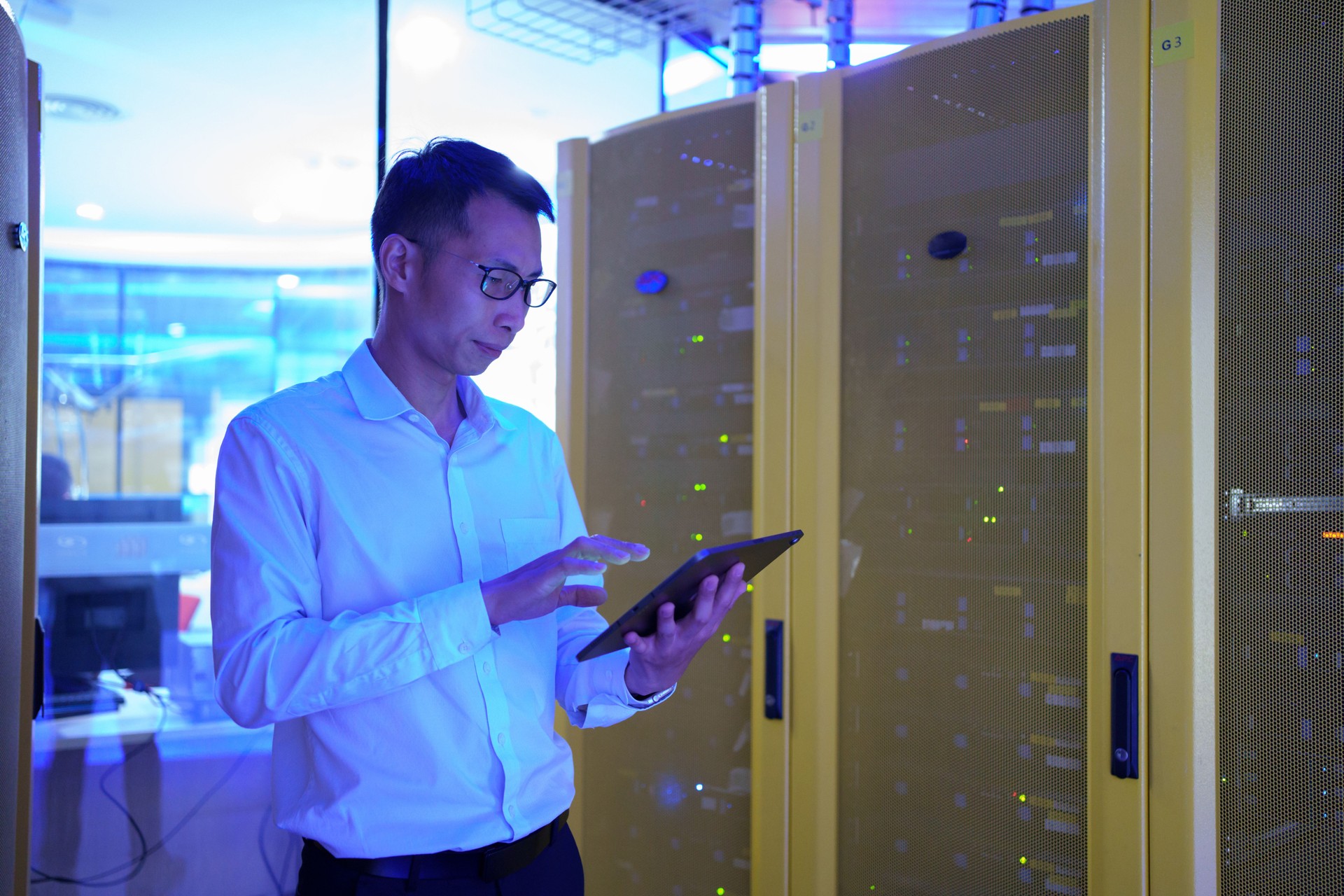 Engineer checking supercomputer server